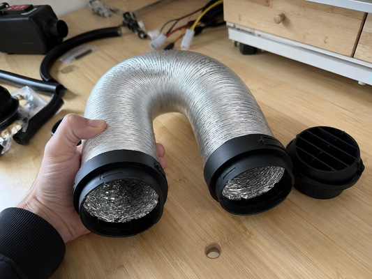 Upgraded flexible air duct for diesel heater installation in camper van